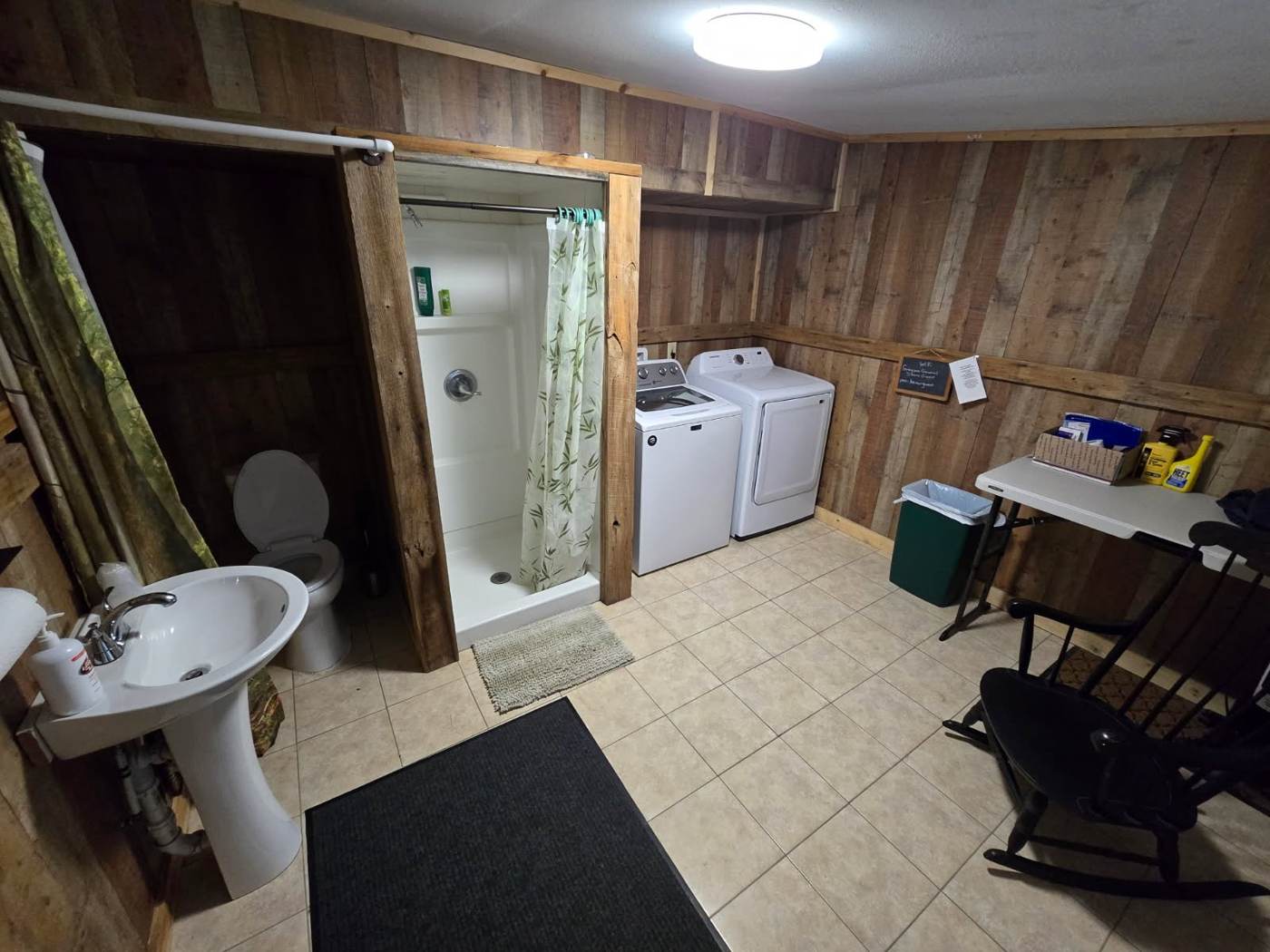 Inside the AT Room: sink, toilet, shower, and washer/dryer for campers.