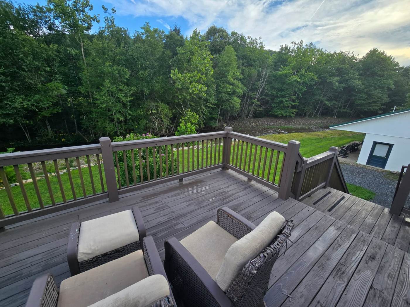 Back patio seating overlooking Big Wilson Creek.